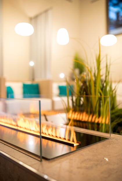 Tischkamin im SPA Bereich der Golf Lodge